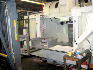 Loading the CNC “Hartford Kappa VMC130” Machining Centre